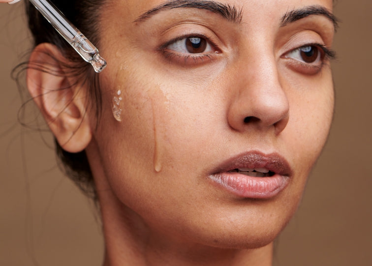 Woman using serum