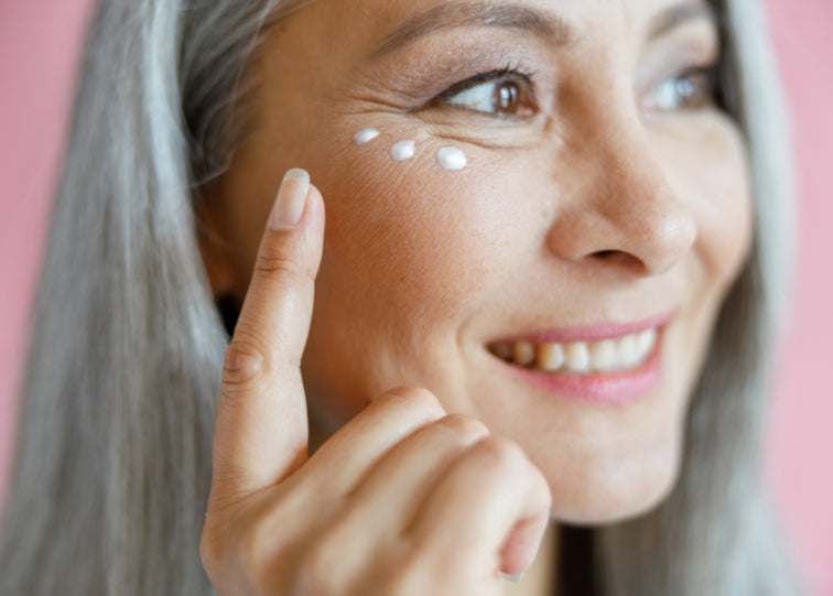 Lady using eye serum