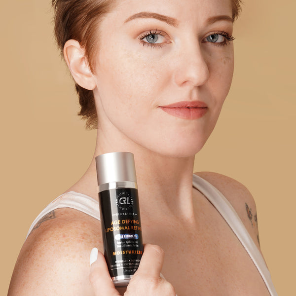 CRL Age Defying Liposomal Retinol in hands women model