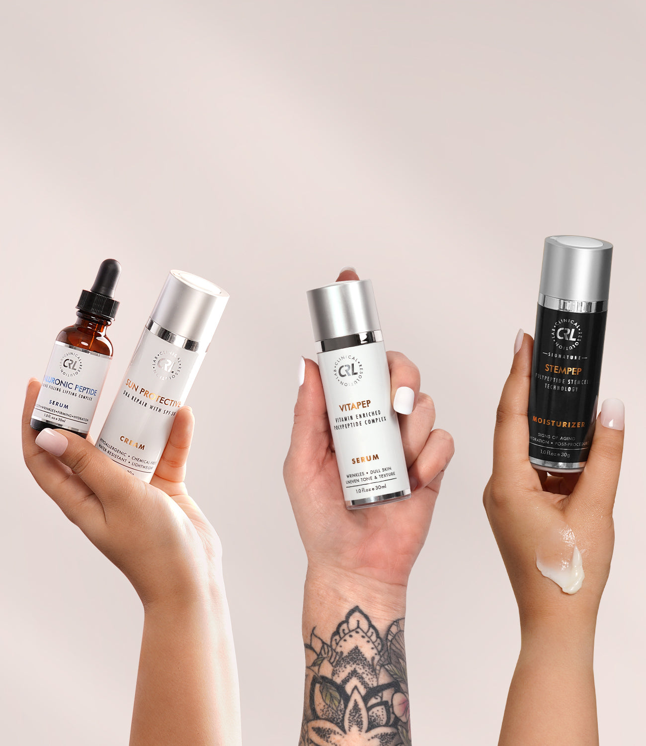 CRL skincare products in hand on light pink background