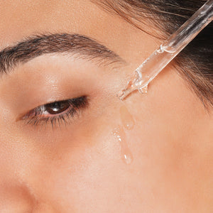 clinical resolution hyaluronic peptide serum on face of model