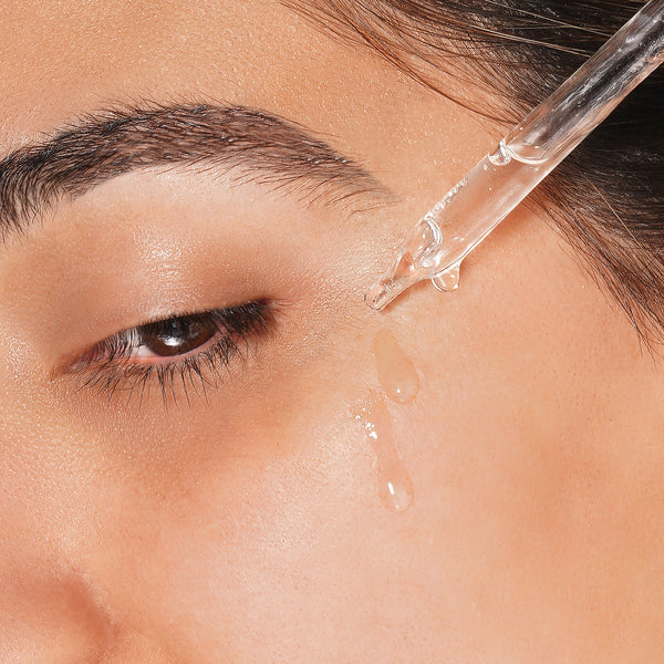 clinical resolution hyaluronic peptide serum on face of model