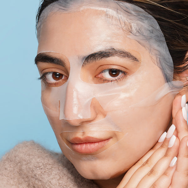 Peptide Aqua Gel Mask on model blue background