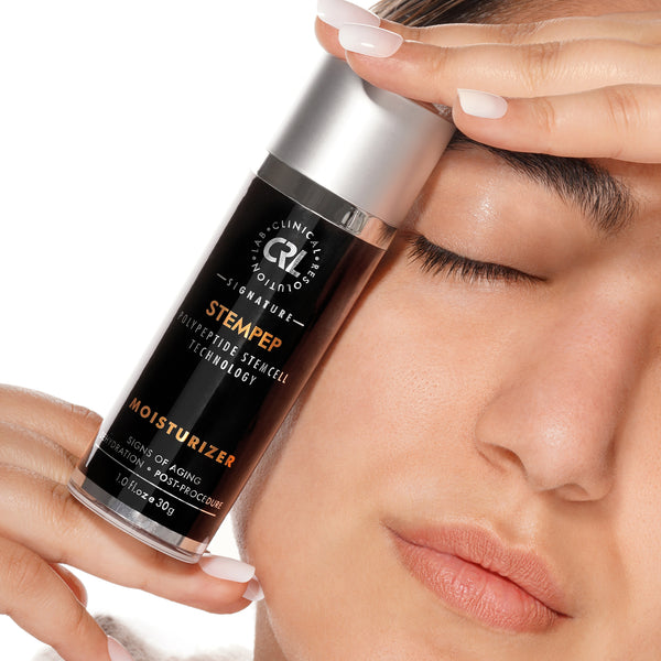 clinical resolution stempep moisturizer in hands of model next to face