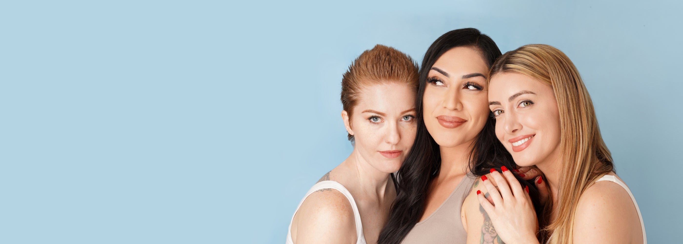 3 women with blue background