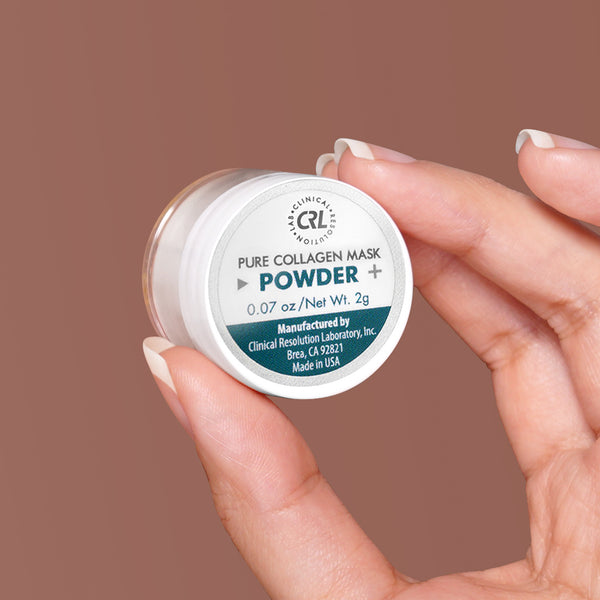 CRL pure collagen mask powder in hand on brown background
