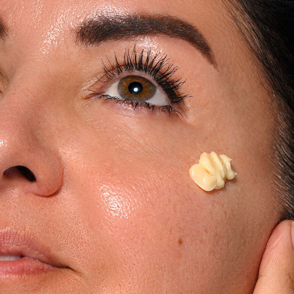 clinical resolution vitapep moisturizer on face of model, bottle in hand